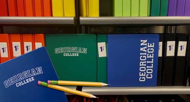 Book supply and several stationary material kept at book shelf